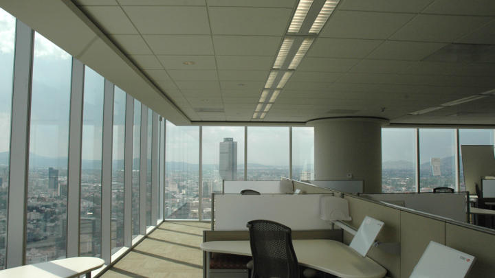 Work area of the HSBC tower with the outside view lit by Philips lighting