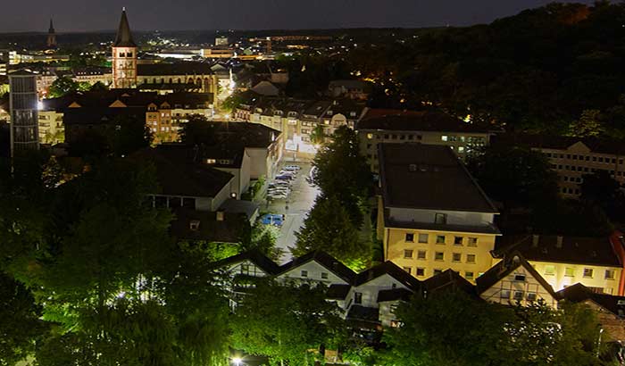 The city of Sieburg, Germany vividly illuminated at night Siegburg